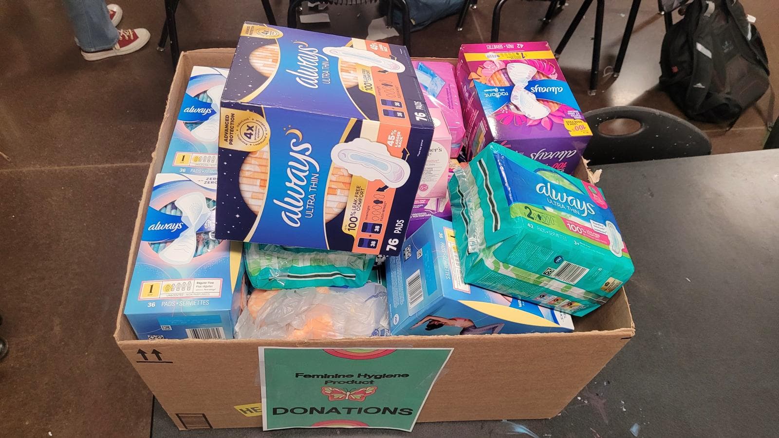 Team collaborating at a KindredGiving donation event